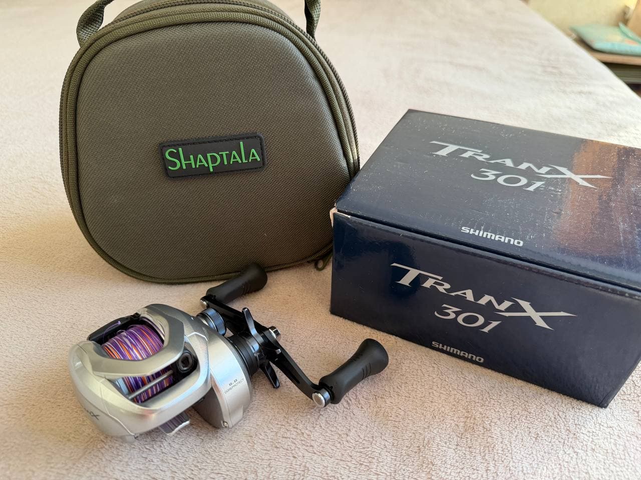 Мультиплікаторна котушка Shimano Tranx 301 A